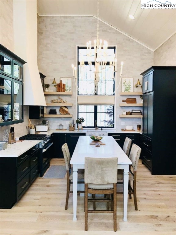 509 Crystal Mountain Road Boone, NC 28607 - Photo 8 of 24 a view of a dining room with furniture and wooden floor