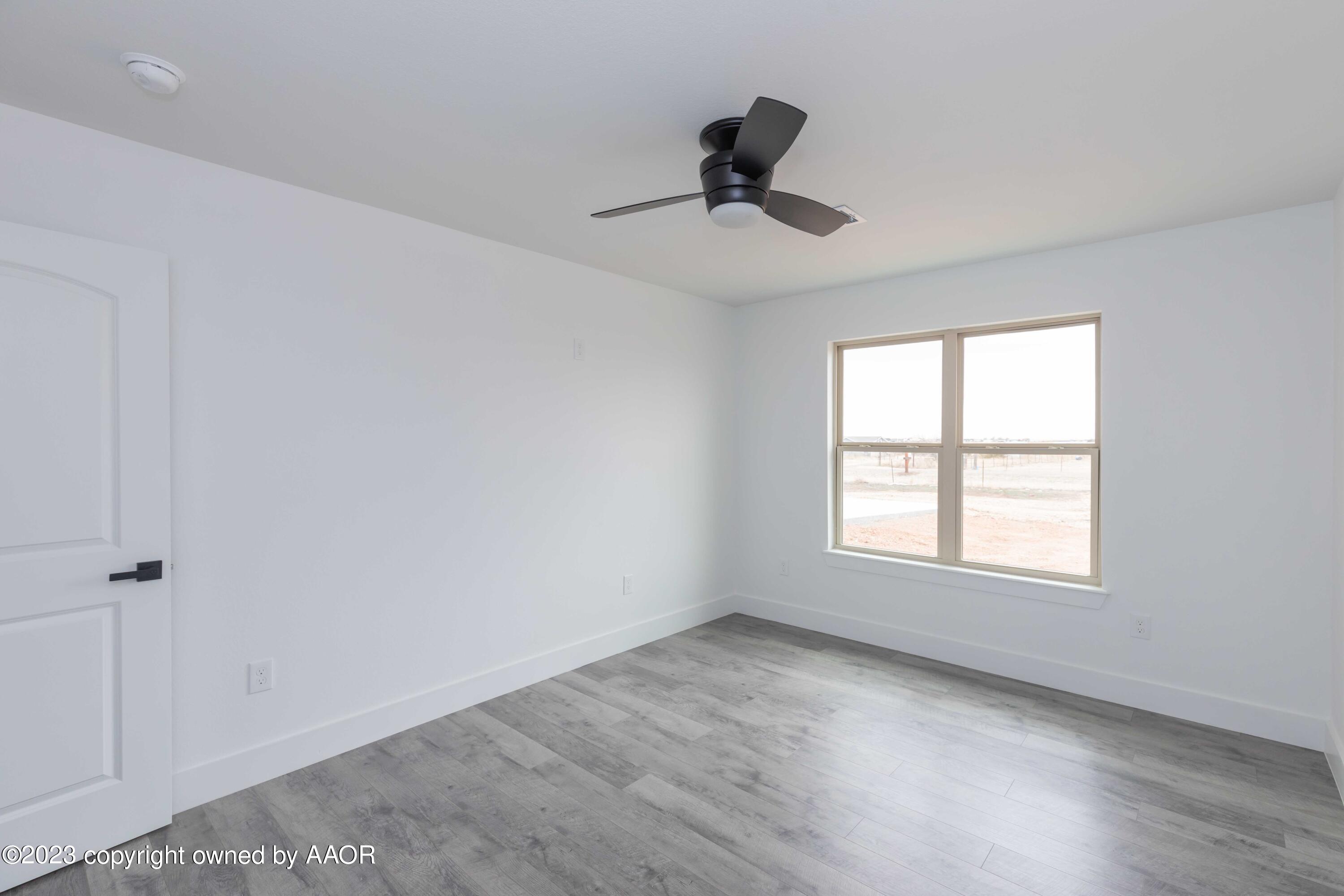 11701 Elk Road Amarillo, TX 79118 - Photo 27 of 39 BEDROOM 2 VIEW 2
