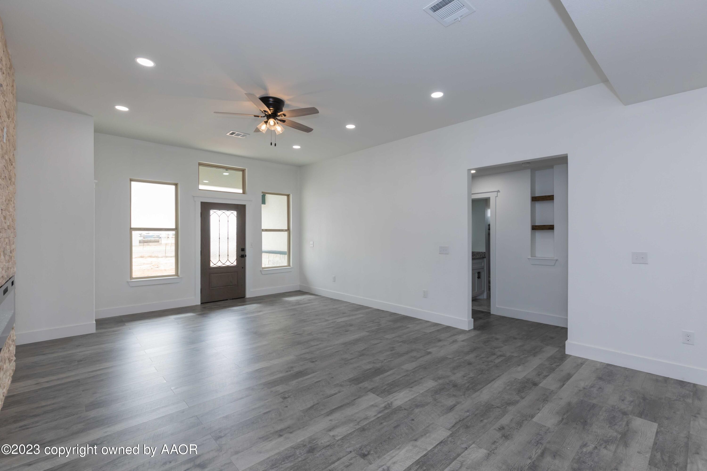 11701 Elk Road Amarillo, TX 79118 - Photo 5 of 39 LIVING ROOM VIEW 1
