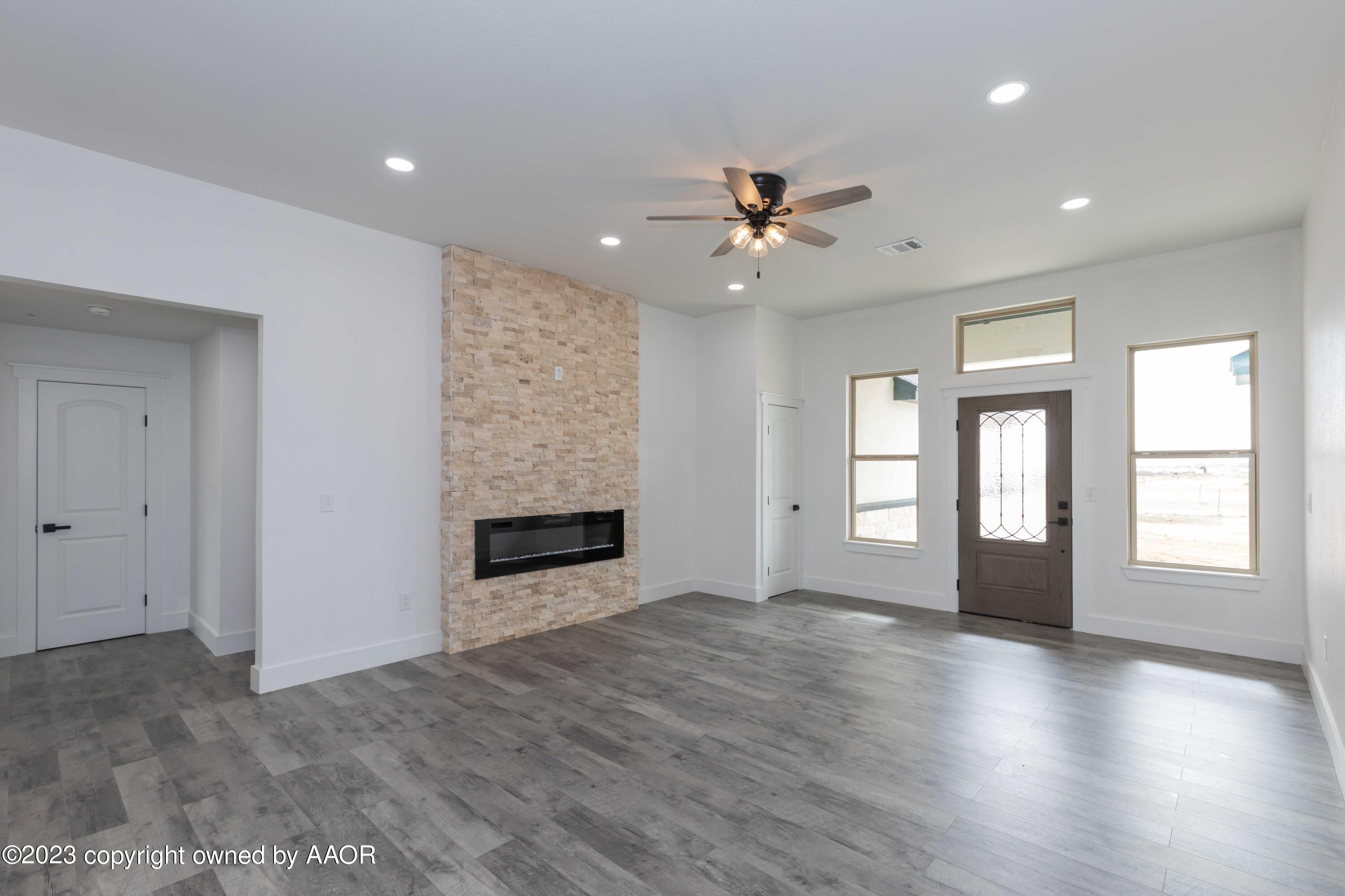 11701 Elk Road Amarillo, TX 79118 - Photo 7 of 39 LIVING ROOM VIEW 3