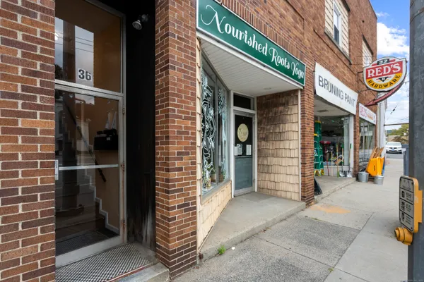 a view of shops in a street