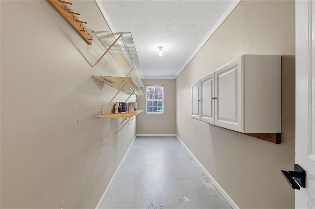 1032 Morgan Road Canton, GA 30115 - Photo 29 of 35 a view of a kitchen with a sink and dishwasher