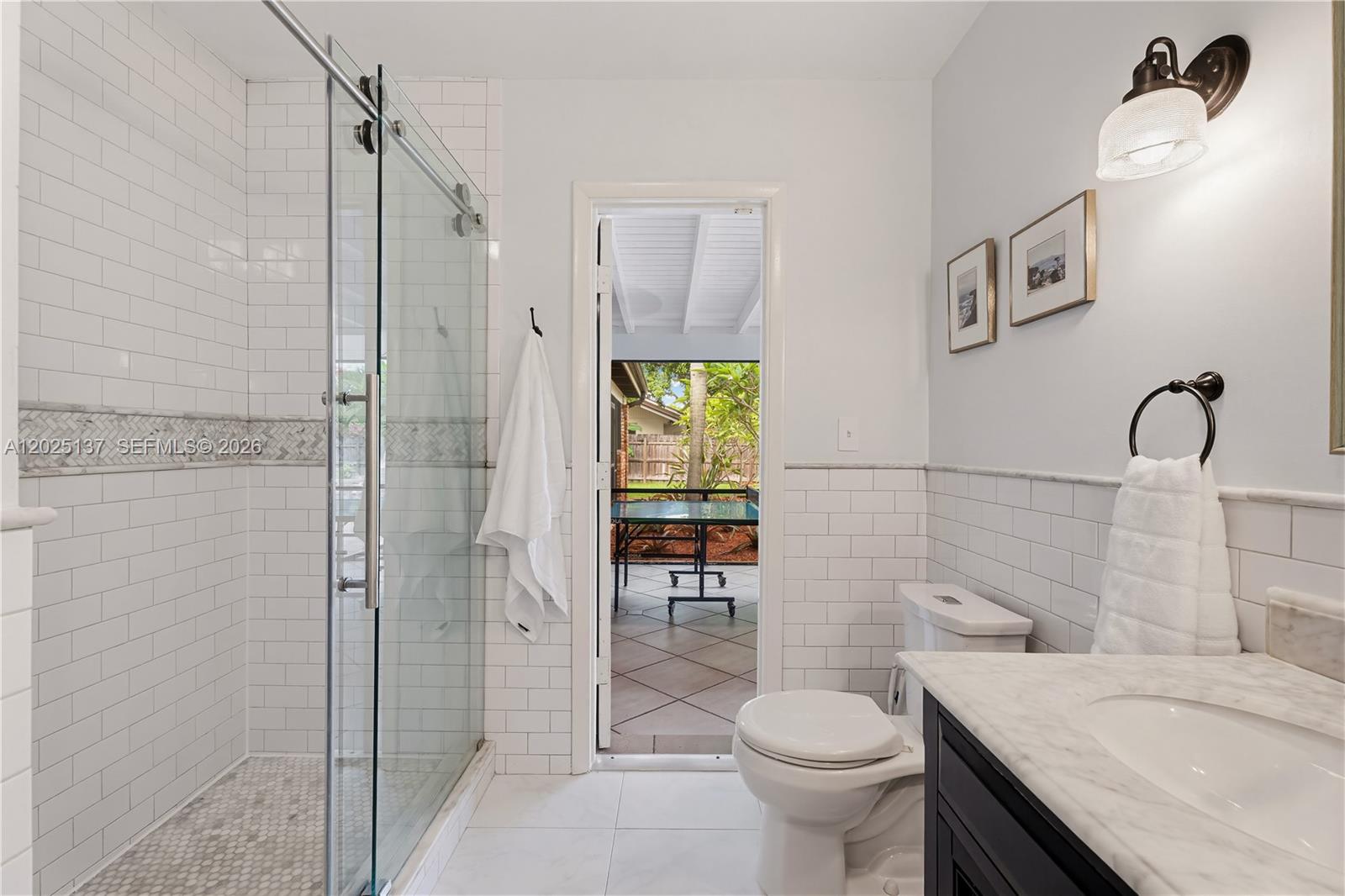 11480 Southwest 96th Terrace Miami, FL 33176 - Photo 21 of 54 a bathroom with a sink toilet and shower
