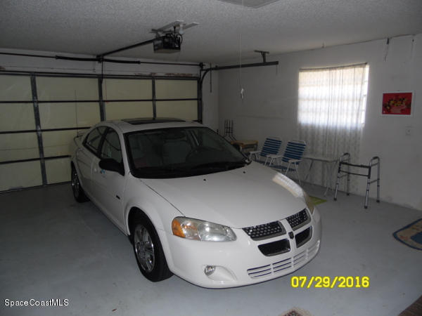 1940 Tallpalm Road Melbourne, FL 32935 - Photo 17 of 22 Garage v1