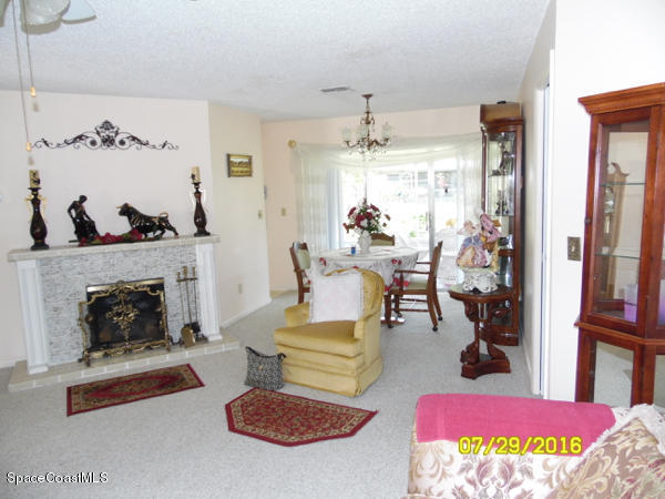 1940 Tallpalm Road Melbourne, FL 32935 - Photo 4 of 22 Living Room