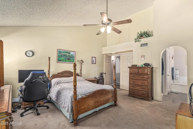a bathroom with a bathtub a sink and mirror