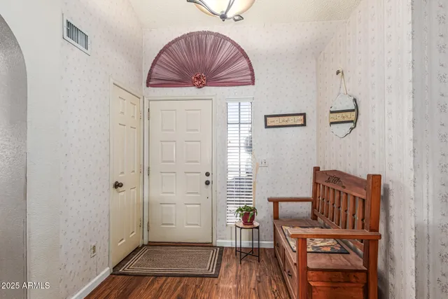 a hallway with a wooden floor
