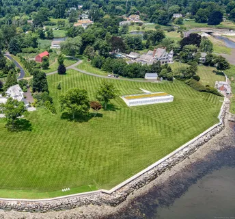 a view of a garden with a lake