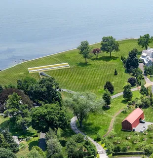 a view of a garden with a building in the background