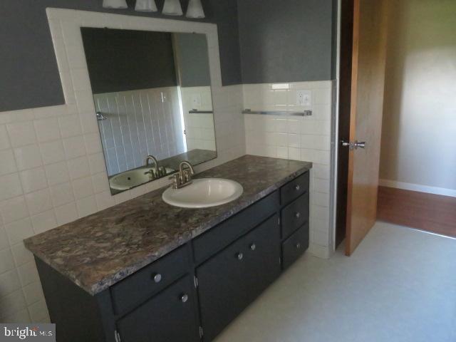 1240 Hoff Road Hanover, PA 17331 - Photo 19 of 51 a bathroom with a granite countertop sink and a mirror