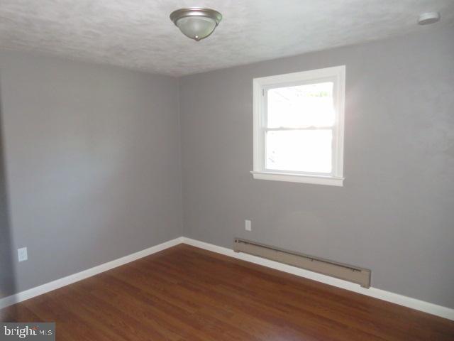 1240 Hoff Road Hanover, PA 17331 - Photo 20 of 51 an empty room with wooden floor and windows
