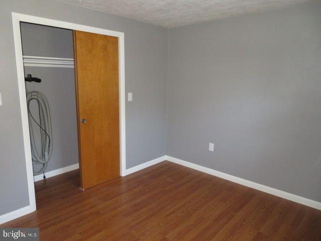 1240 Hoff Road Hanover, PA 17331 - Photo 21 of 51 a view of empty room with wooden floor and window