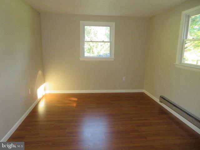 1240 Hoff Road Hanover, PA 17331 - Photo 23 of 51 a view of an empty room with wooden floor and a window