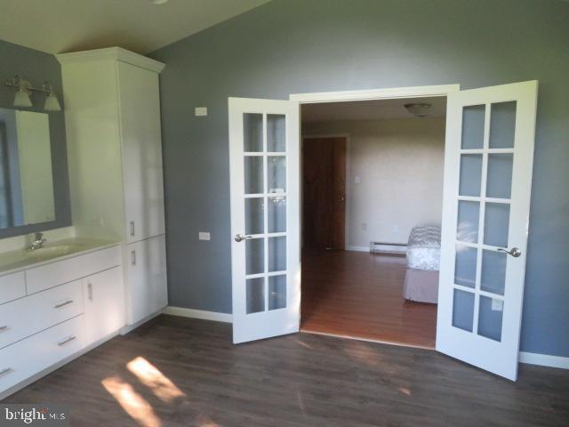 1240 Hoff Road Hanover, PA 17331 - Photo 31 of 51 a view of empty room with wooden floor and cabinet