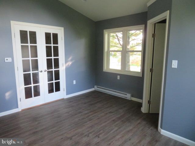1240 Hoff Road Hanover, PA 17331 - Photo 38 of 51 a view of an empty room with wooden floor and windows