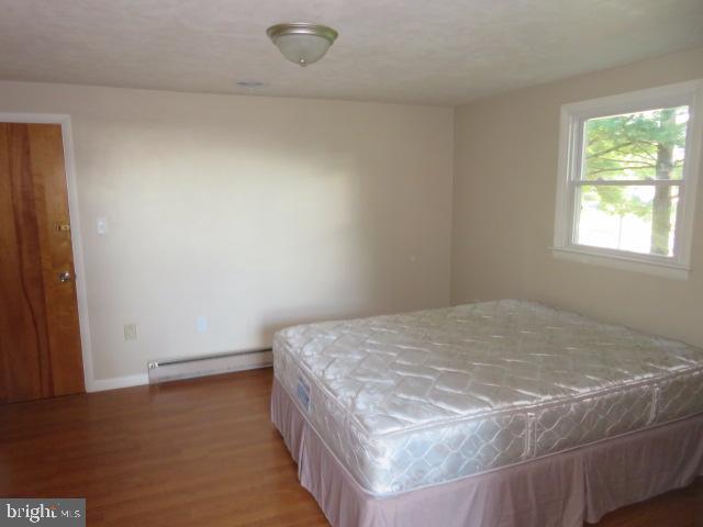 1240 Hoff Road Hanover, PA 17331 - Photo 41 of 51 a bed sitting in a bedroom next to a window
