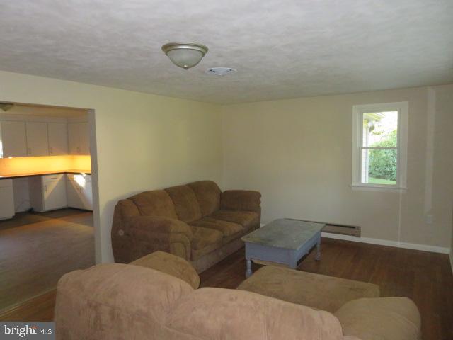 1240 Hoff Road Hanover, PA 17331 - Photo 50 of 51 a living room with furniture and a lamp