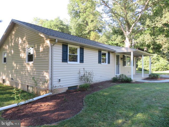 1240 Hoff Road Hanover, PA 17331 - Photo 6 of 51 a view of backyard with a garden and plants