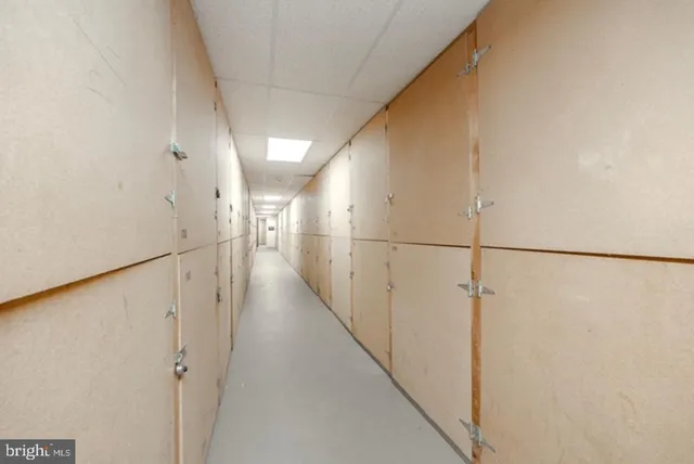 a view of a patio with a dining table and chairs
