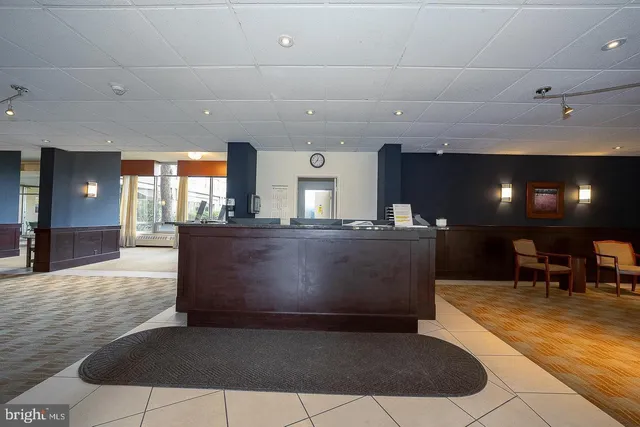 a view of a living room and a kitchen