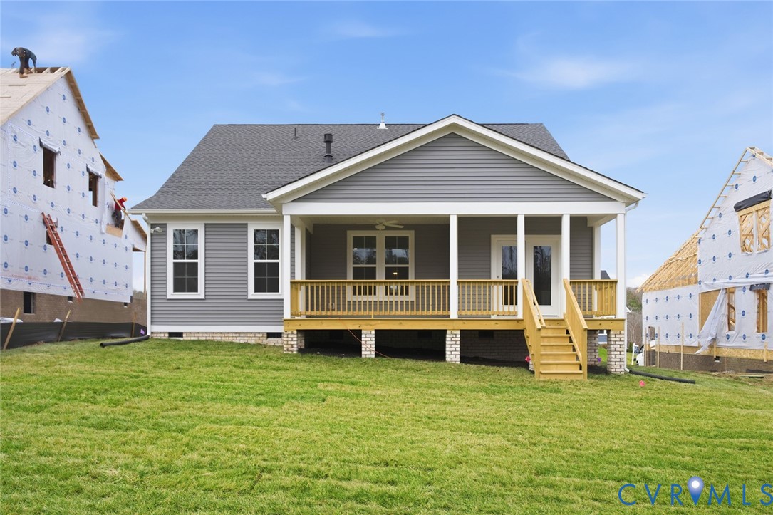 19018 Palisades Ridge Moseley, VA 23120 - Photo 21 of 37 a front view of a house with a garden