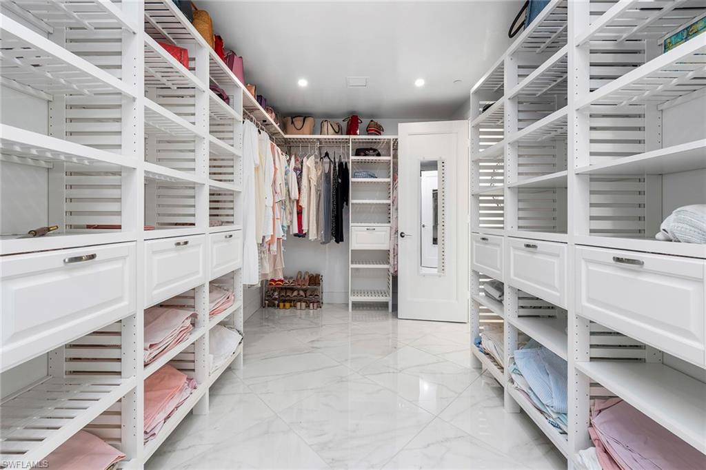 13945 Old Coast Road, Unit 806 Naples, FL 34110 - Photo 19 of 50 view of hall with windows