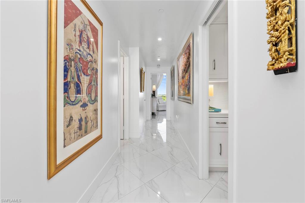13945 Old Coast Road, Unit 806 Naples, FL 34110 - Photo 20 of 50 a view of an entryway with wooden floor