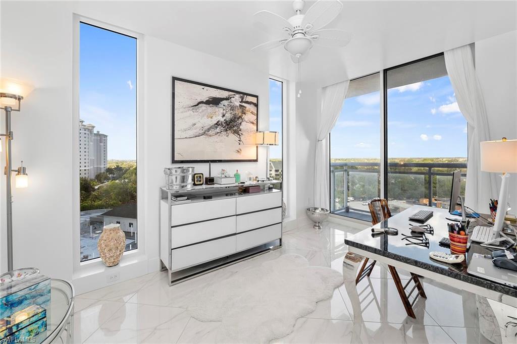 13945 Old Coast Road, Unit 806 Naples, FL 34110 - Photo 27 of 50 a view of a livingroom with furniture and window