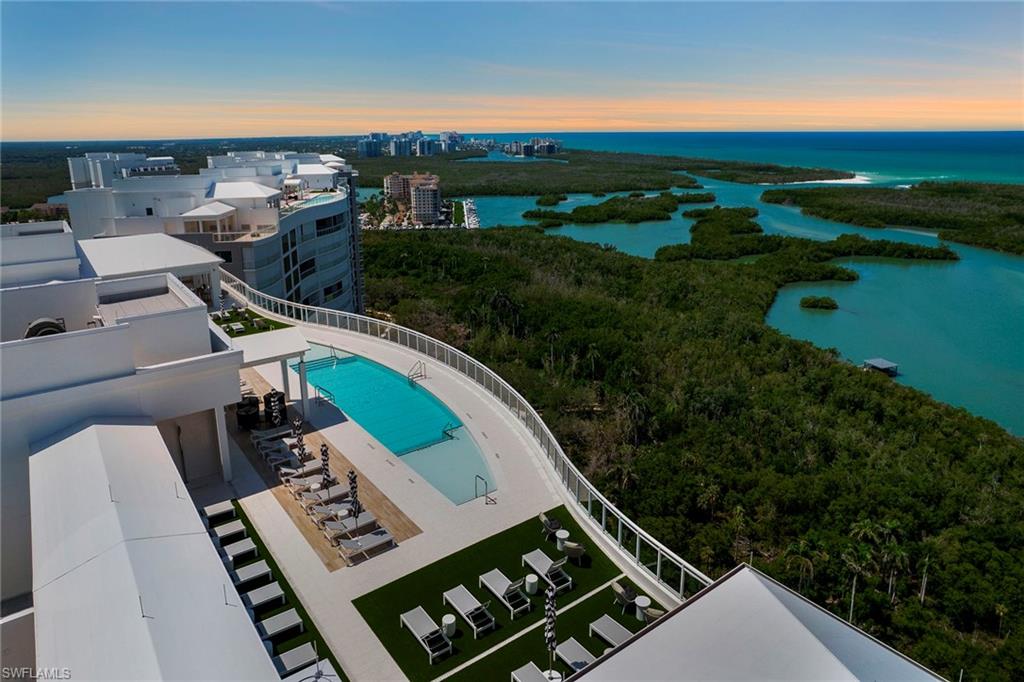 13945 Old Coast Road, Unit 806 Naples, FL 34110 - Photo 35 of 50 a view of a balcony with chairs