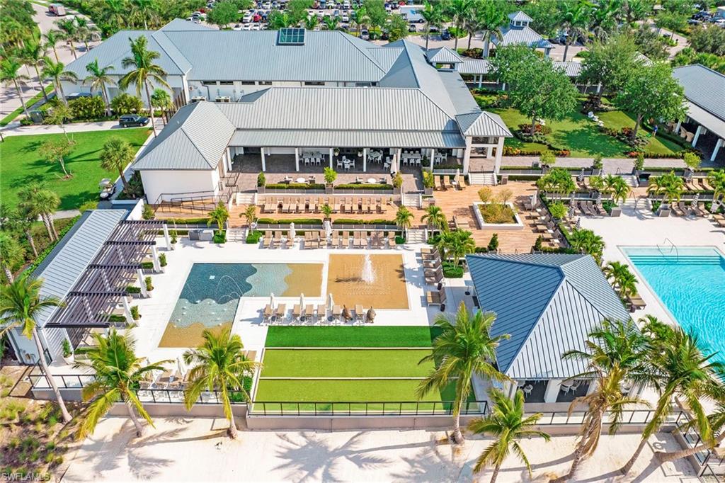 13945 Old Coast Road, Unit 806 Naples, FL 34110 - Photo 44 of 50 a view of a house with a yard