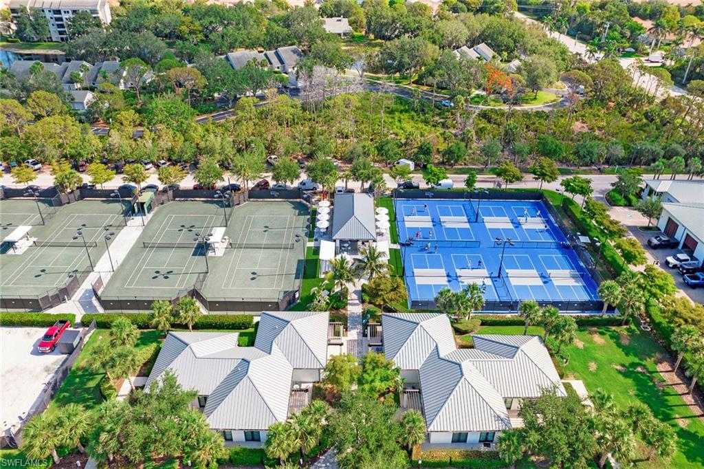 13945 Old Coast Road, Unit 806 Naples, FL 34110 - Photo 45 of 50 an aerial view of multiple houses with yard