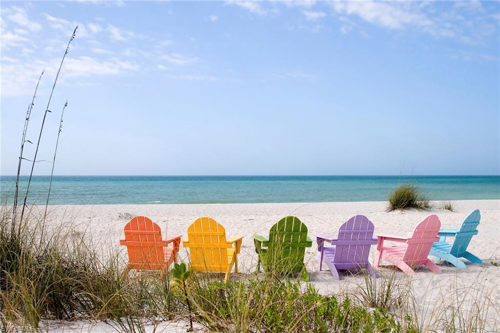 13945 Old Coast Road, Unit 806 Naples, FL 34110 - Photo 47 of 50 a view of swimming pool with a yard