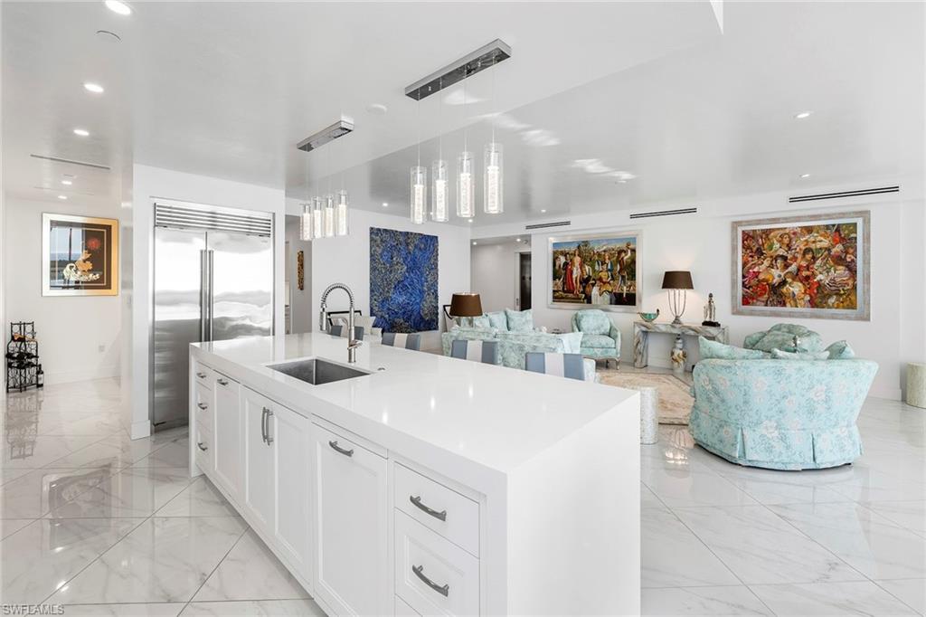 13945 Old Coast Road, Unit 806 Naples, FL 34110 - Photo 50 of 50 a large white kitchen with a large window