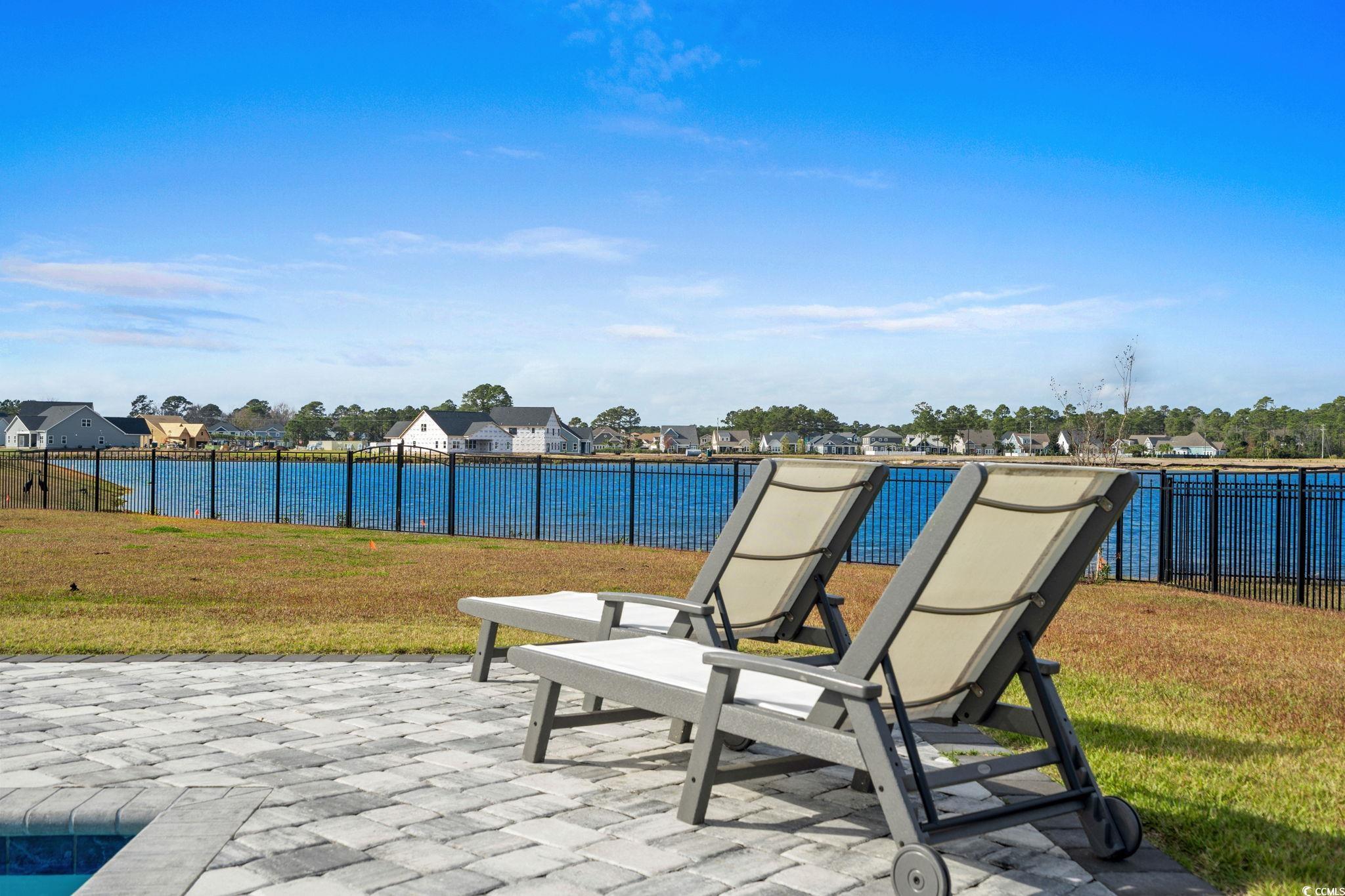 506 Indigo Bay Circle Myrtle Beach, SC 29579 - Photo 21 of 40 View of home's community with a patio and a water view