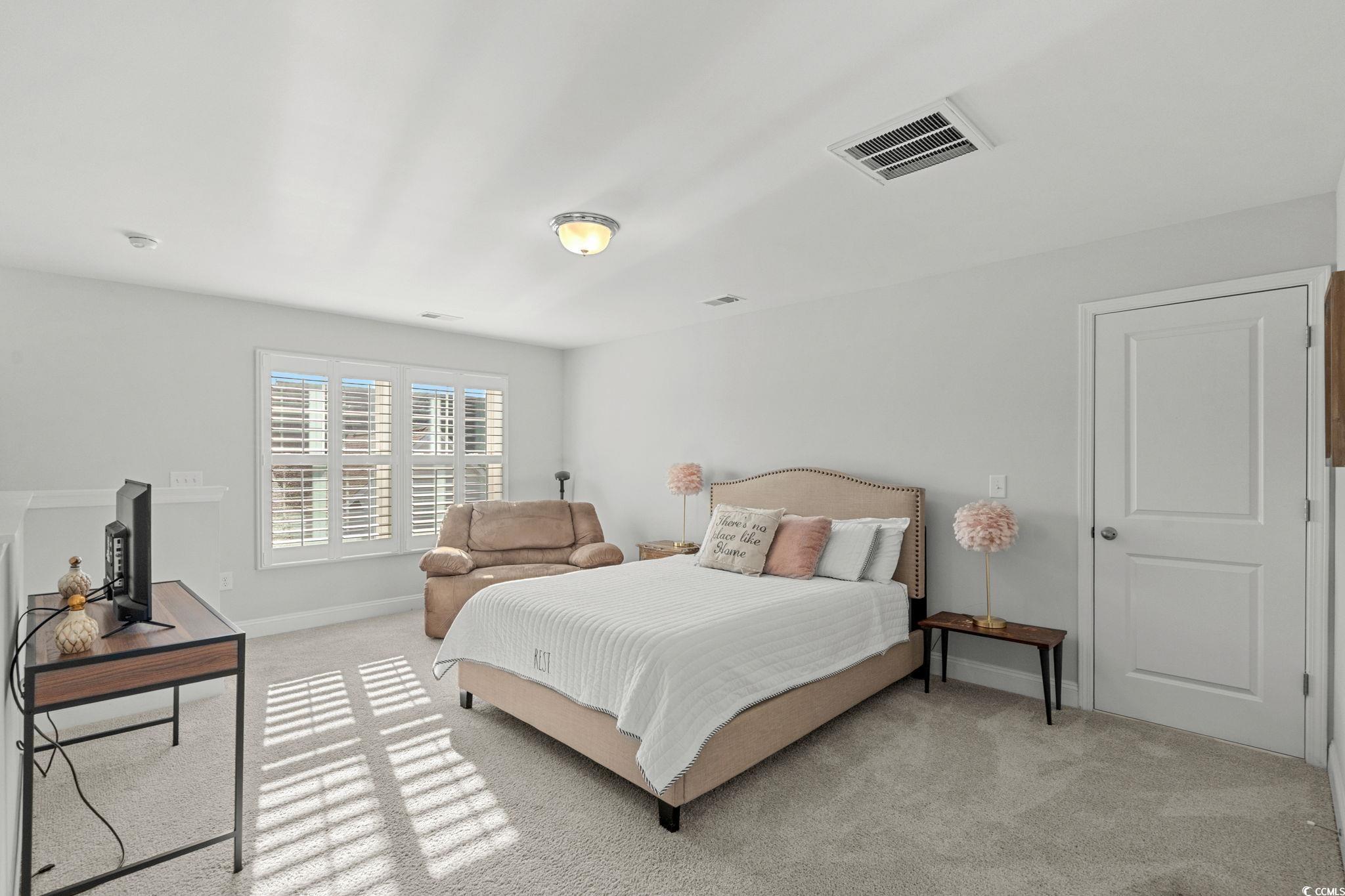 506 Indigo Bay Circle Myrtle Beach, SC 29579 - Photo 29 of 40 Bedroom featuring light colored carpet