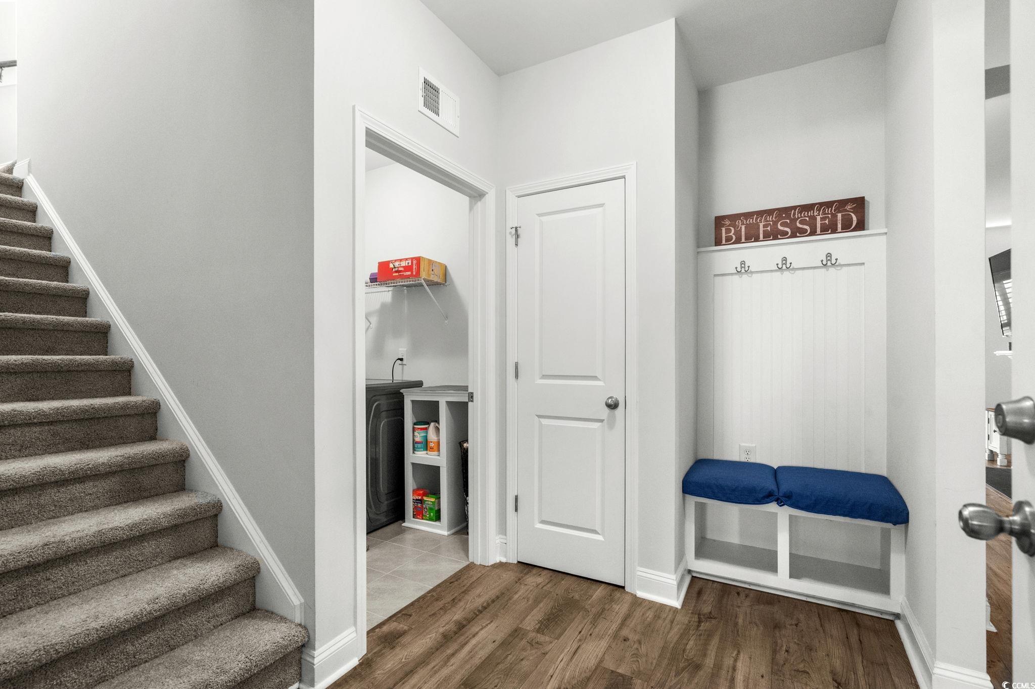 506 Indigo Bay Circle Myrtle Beach, SC 29579 - Photo 31 of 40 Mudroom featuring dark wood-style flooring and baseboards