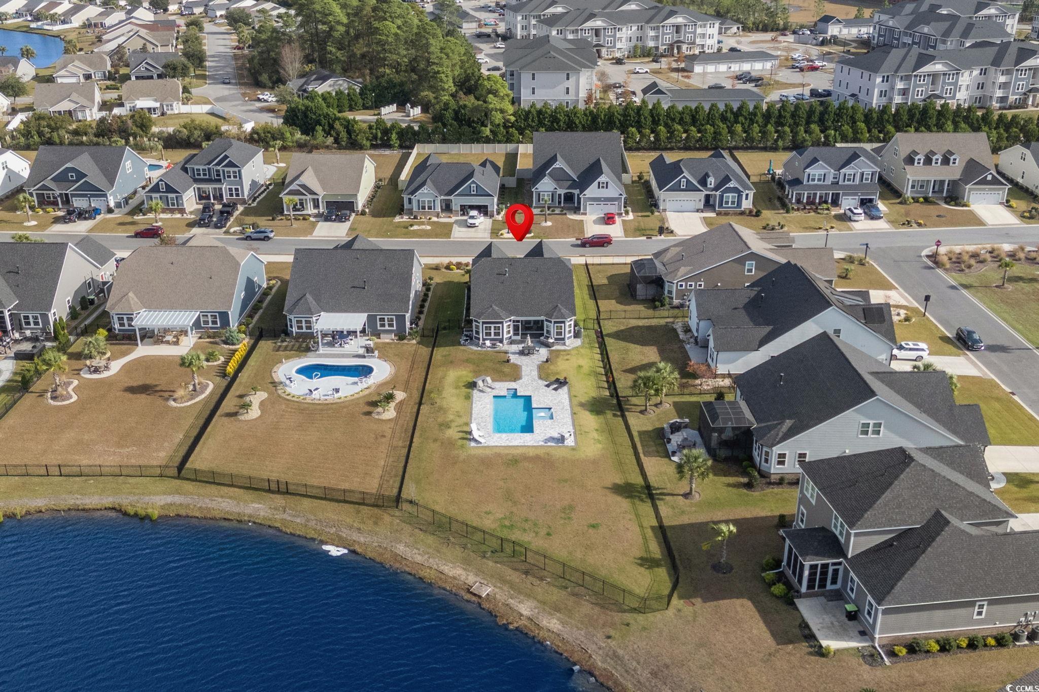 506 Indigo Bay Circle Myrtle Beach, SC 29579 - Photo 34 of 40 Aerial perspective of suburban area with a nearby body of water