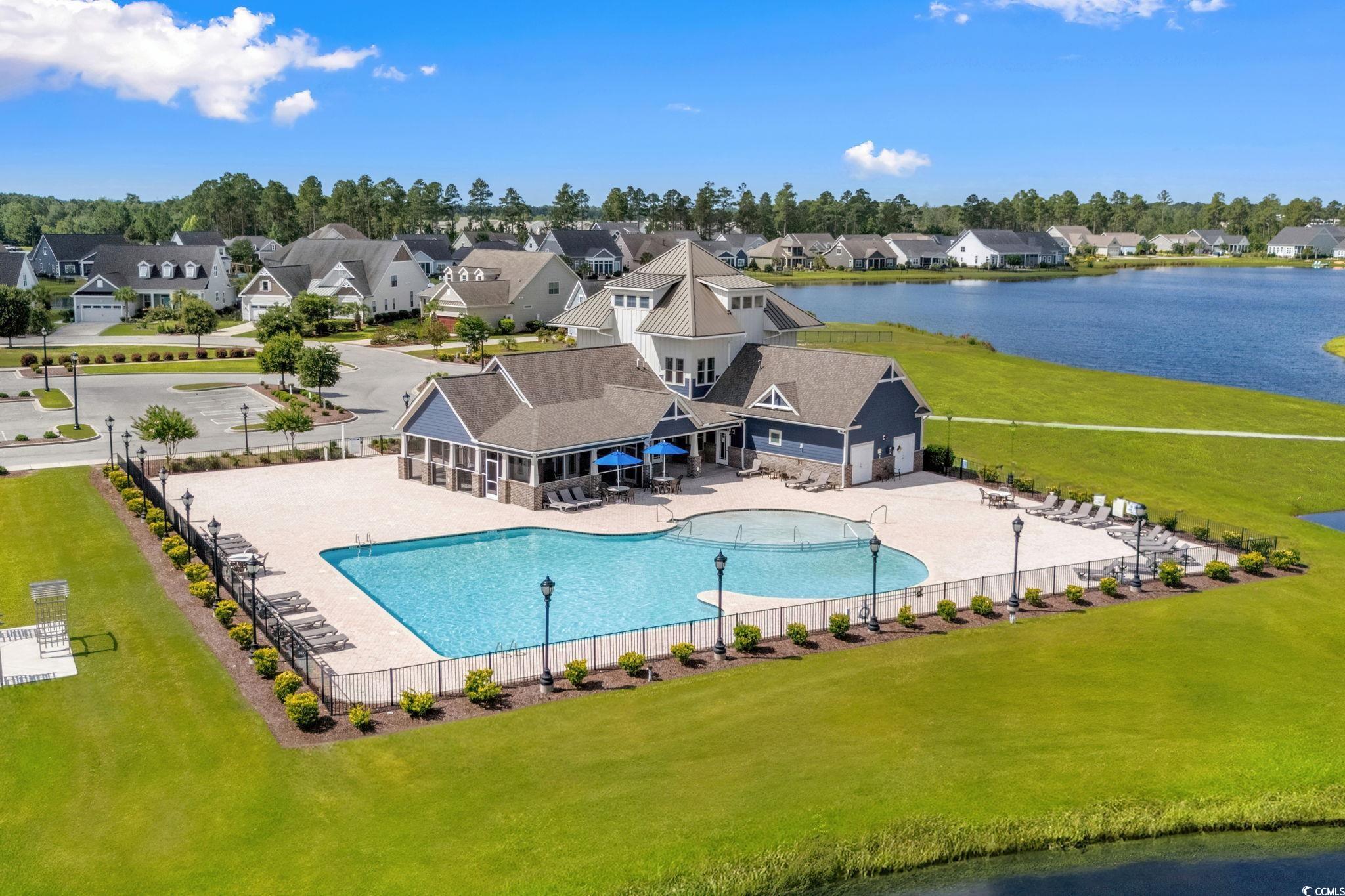 506 Indigo Bay Circle Myrtle Beach, SC 29579 - Photo 36 of 40 Community pool with a patio area, a water view, and a residential view