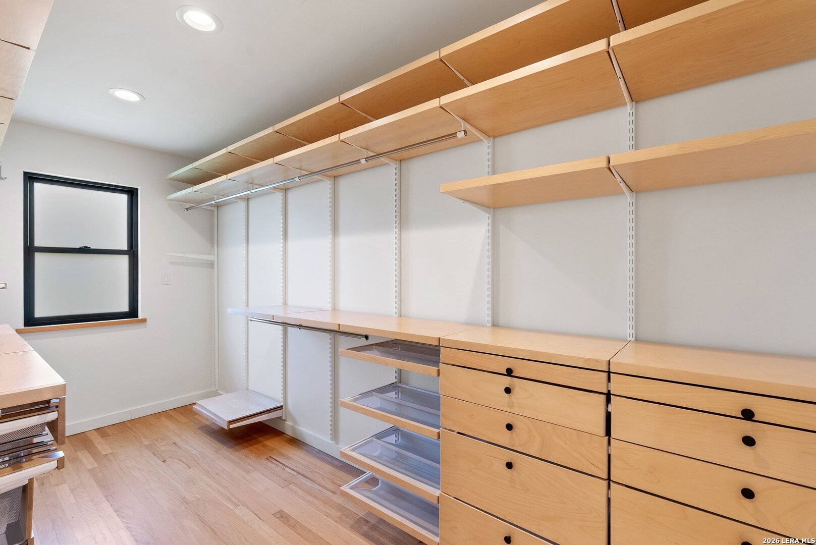 1402 Hutto Road Georgetown, TX 78626 - Photo 26 of 34 a view of walk in closet with window