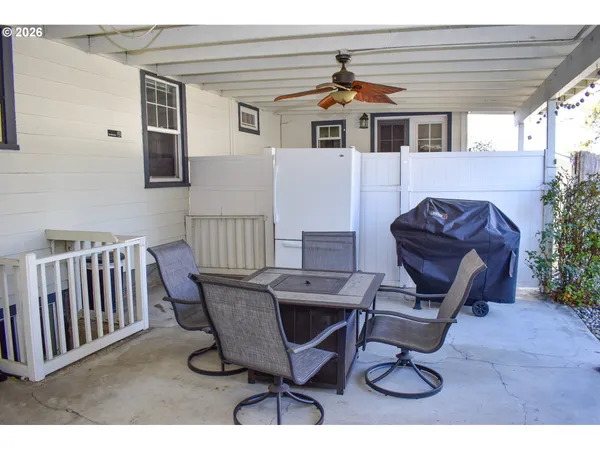 a view of a workspace with furniture