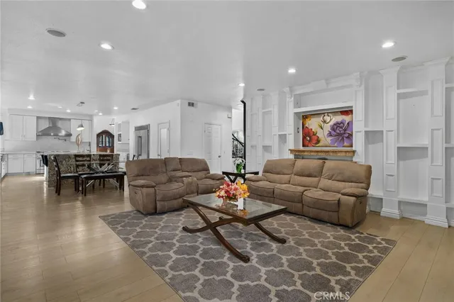 a view of hallway with wooden floor