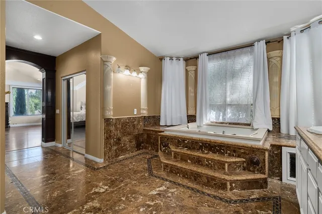 an aerial view of residential building with parking space