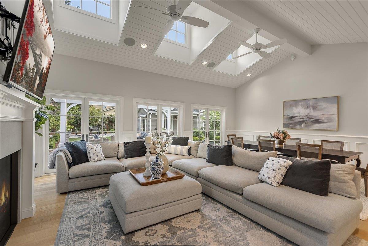593 Sleeper Avenue Mountain View, CA 94040 - Photo 14 of 56 a living room with furniture ceiling fan and a large window