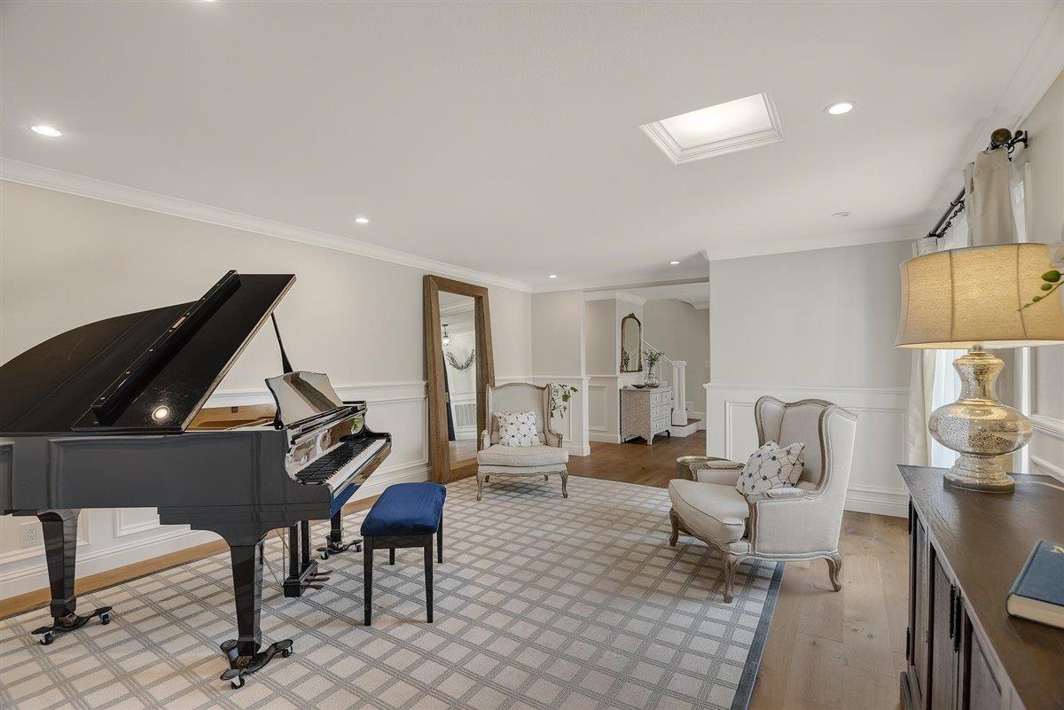 593 Sleeper Avenue Mountain View, CA 94040 - Photo 17 of 56 a living room with furniture a rug and a piano