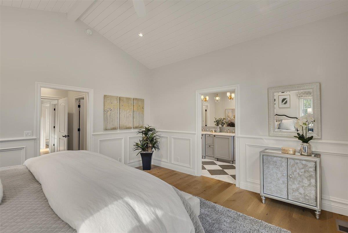 593 Sleeper Avenue Mountain View, CA 94040 - Photo 19 of 56 a bedroom with a bed and a large mirror