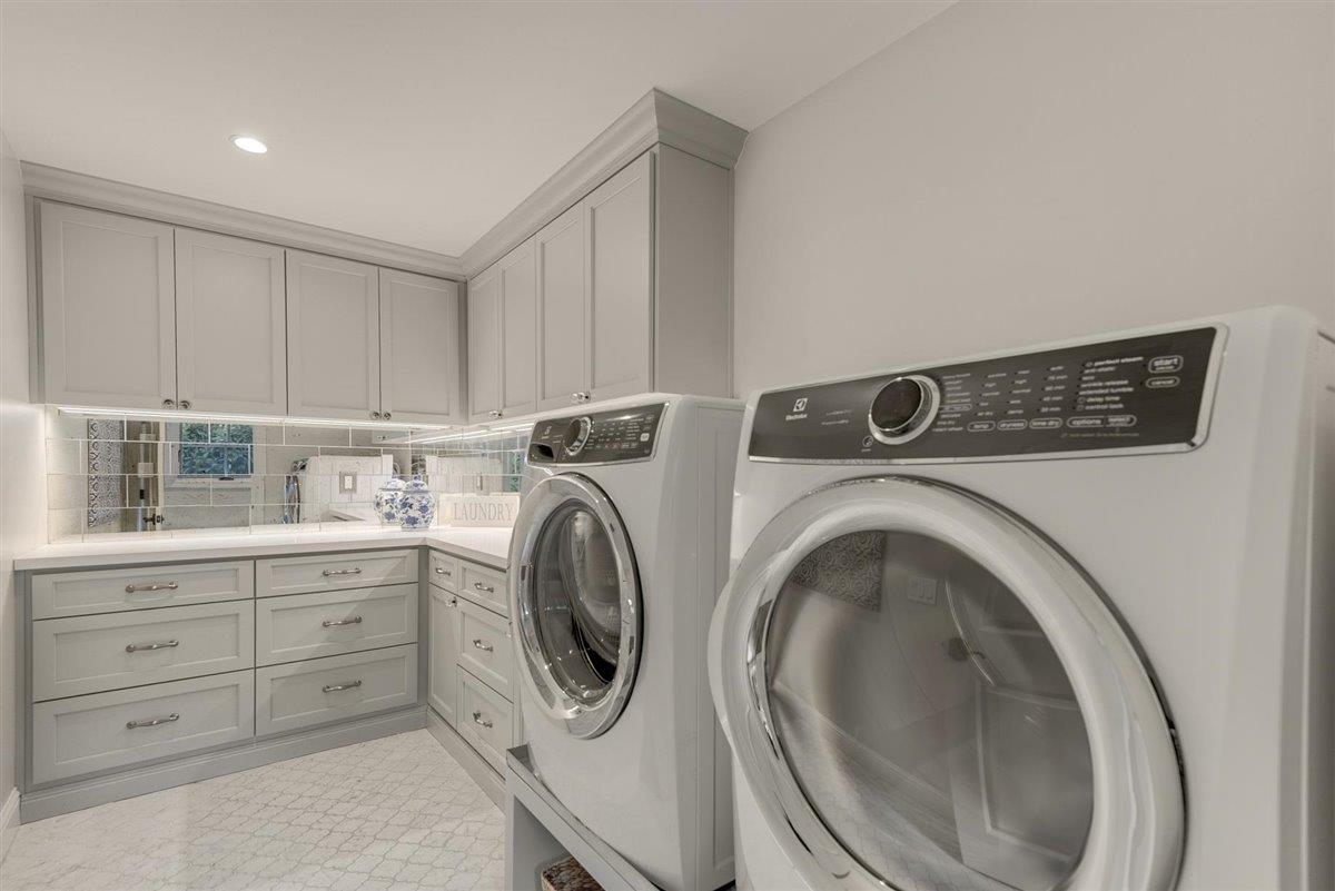 593 Sleeper Avenue Mountain View, CA 94040 - Photo 23 of 56 a utility room with sink dryer and washer