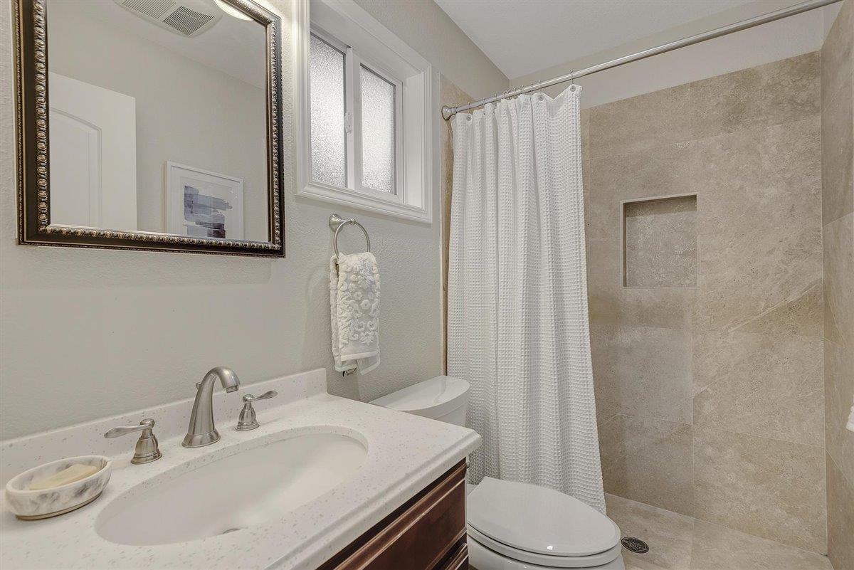593 Sleeper Avenue Mountain View, CA 94040 - Photo 25 of 56 a bathroom with a sink toilet and shower