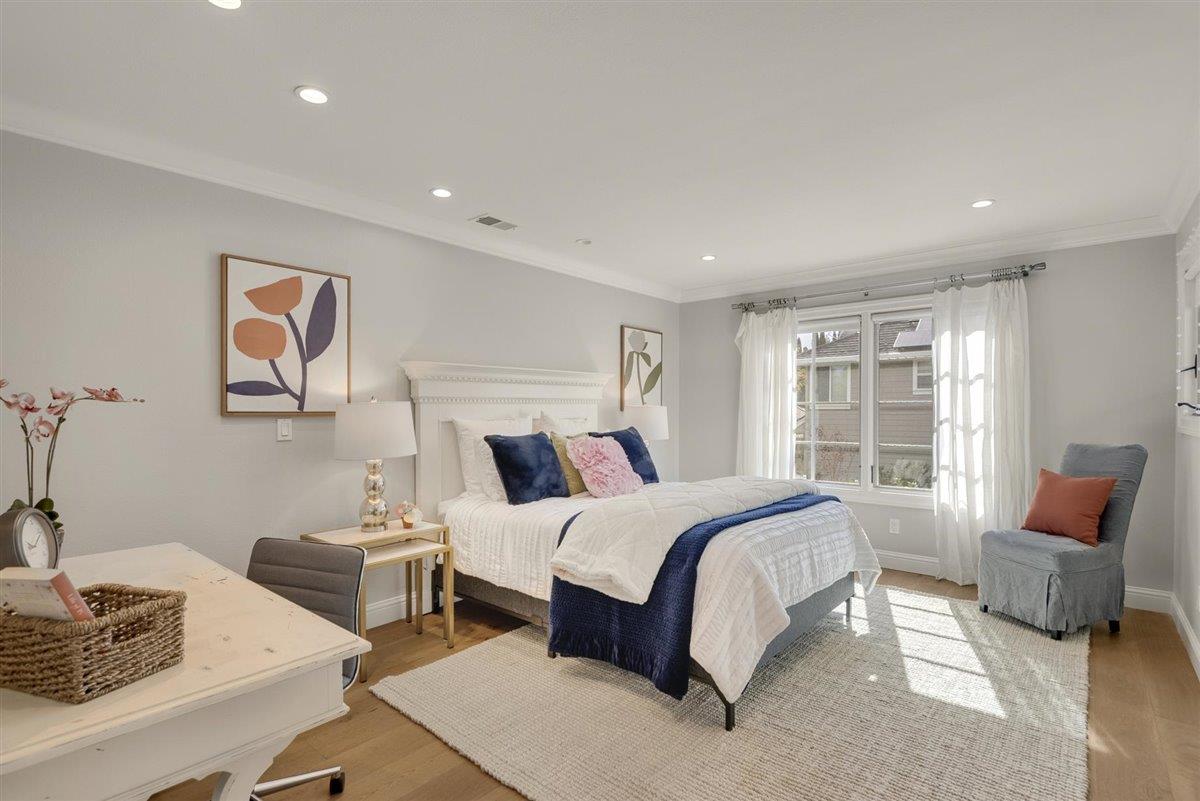 593 Sleeper Avenue Mountain View, CA 94040 - Photo 26 of 56 a bedroom with a bed and glass window