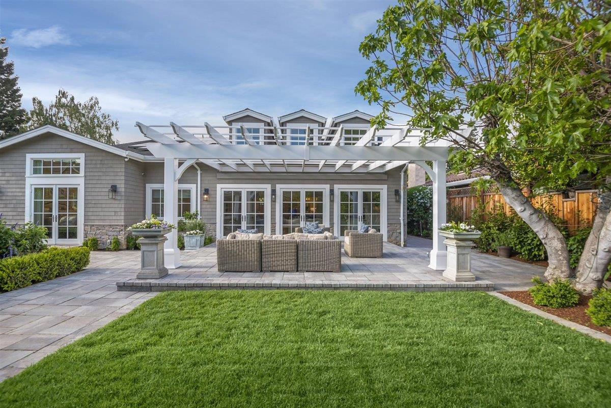 593 Sleeper Avenue Mountain View, CA 94040 - Photo 38 of 56 a view of a house with a patio and a yard