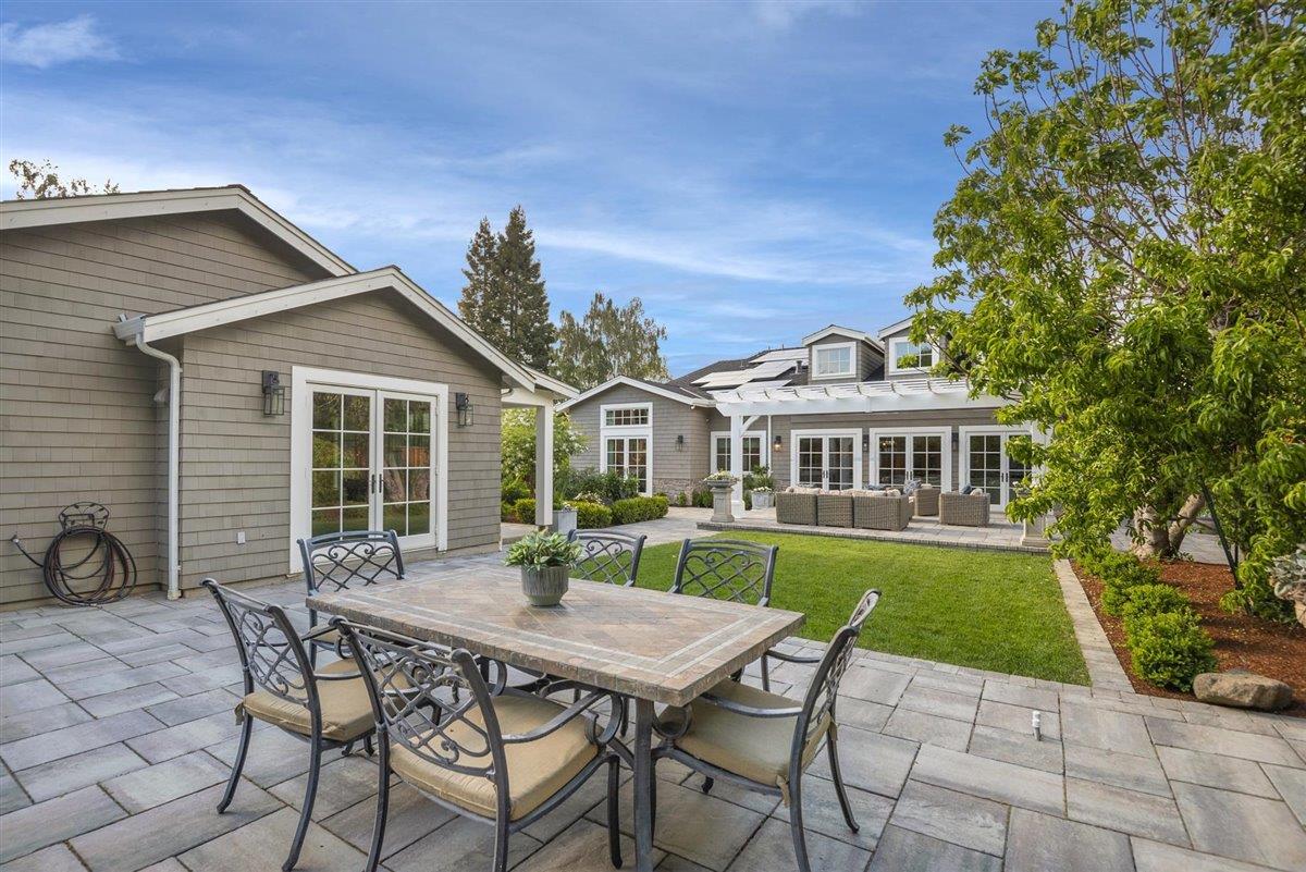 593 Sleeper Avenue Mountain View, CA 94040 - Photo 41 of 56 a view of a house with backyard sitting area and garden